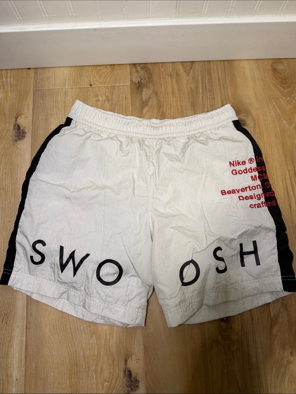 Nike White Athletic Shorts with Black Side Panels and Red Logo small